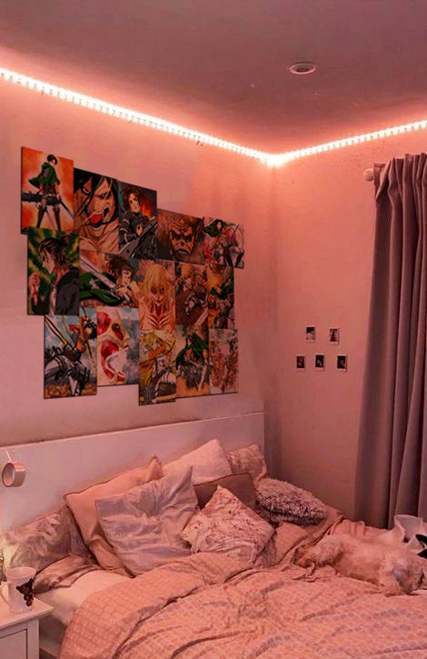 Attack on titan posters on bedroom wall with orange led strip lights
