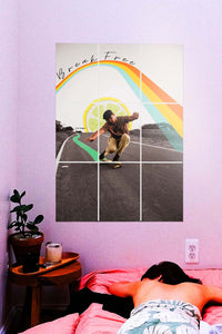 girl lying on the bed with a big poster on wall