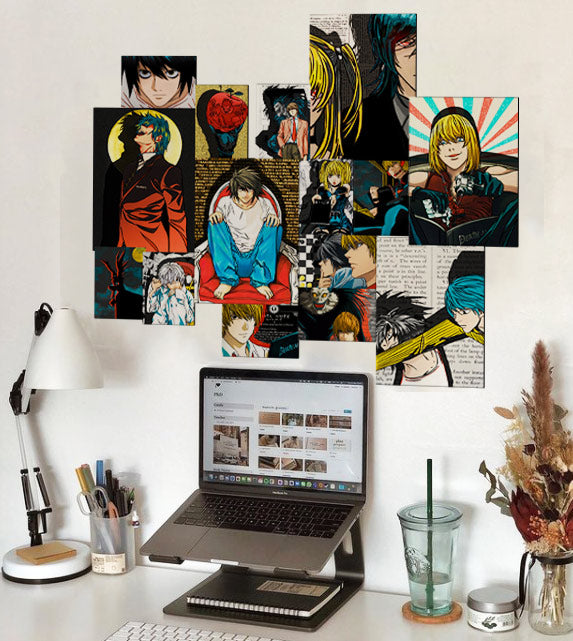 Death note anime posters on wall behind a laptop 