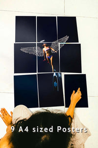 girl sitting with 9 set posters on the floor