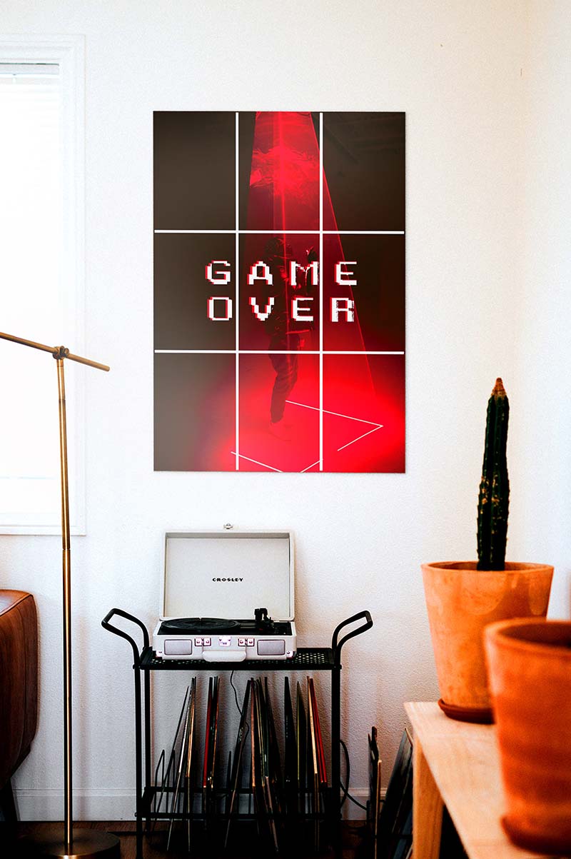 Red game over poster on wall