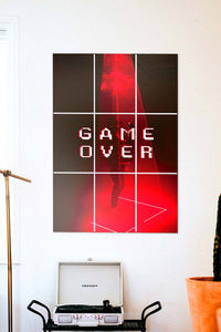 Red game over poster on wall