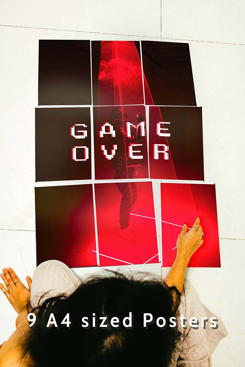 girl sitting with 9 set posters on the floor