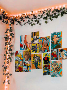 One Punch Man anime posters collage kit on a wall with string lights & vines