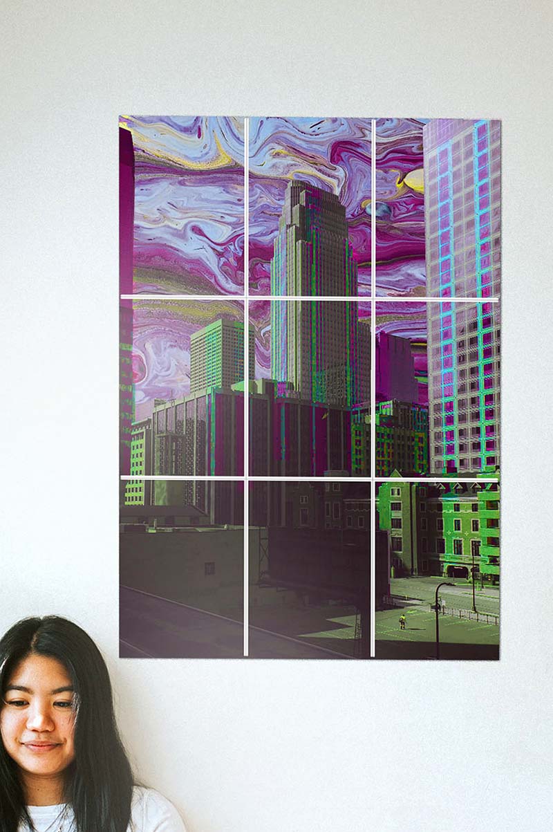 Big block kit poster of a city with purple skies next to a girl smiling