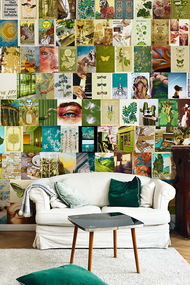 Sage green posters collage behind a white couch in a living room