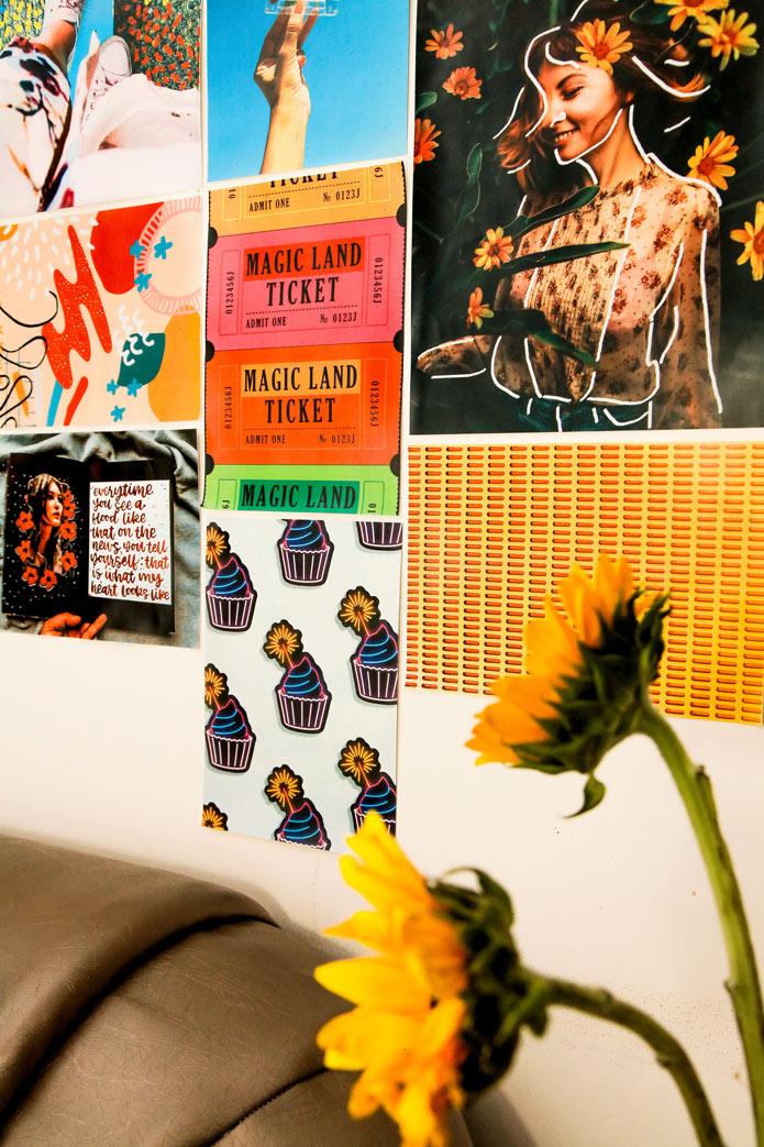colorful doodled mini kit posters on wall net to sunflowers and over a couch