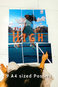 girl sitting with 9 set posters on the floor