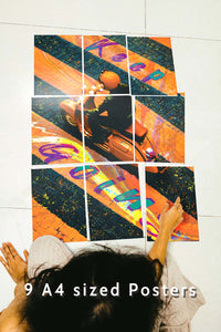 girl sitting with block kit 9 set posters on the floor