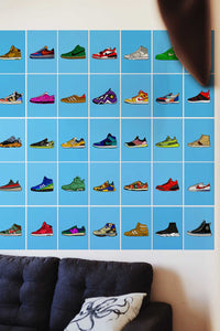 Sneaker posters collage on a wall behind couch